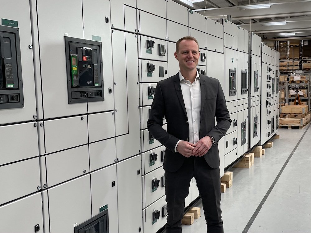 Morten in front of data center switchboard 2021